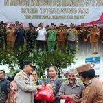 Polres Gunung Mas Hadiri Pembukaan TMMD Imbangan Ke-127 di Kecamatan Tewah  Isi Berita: